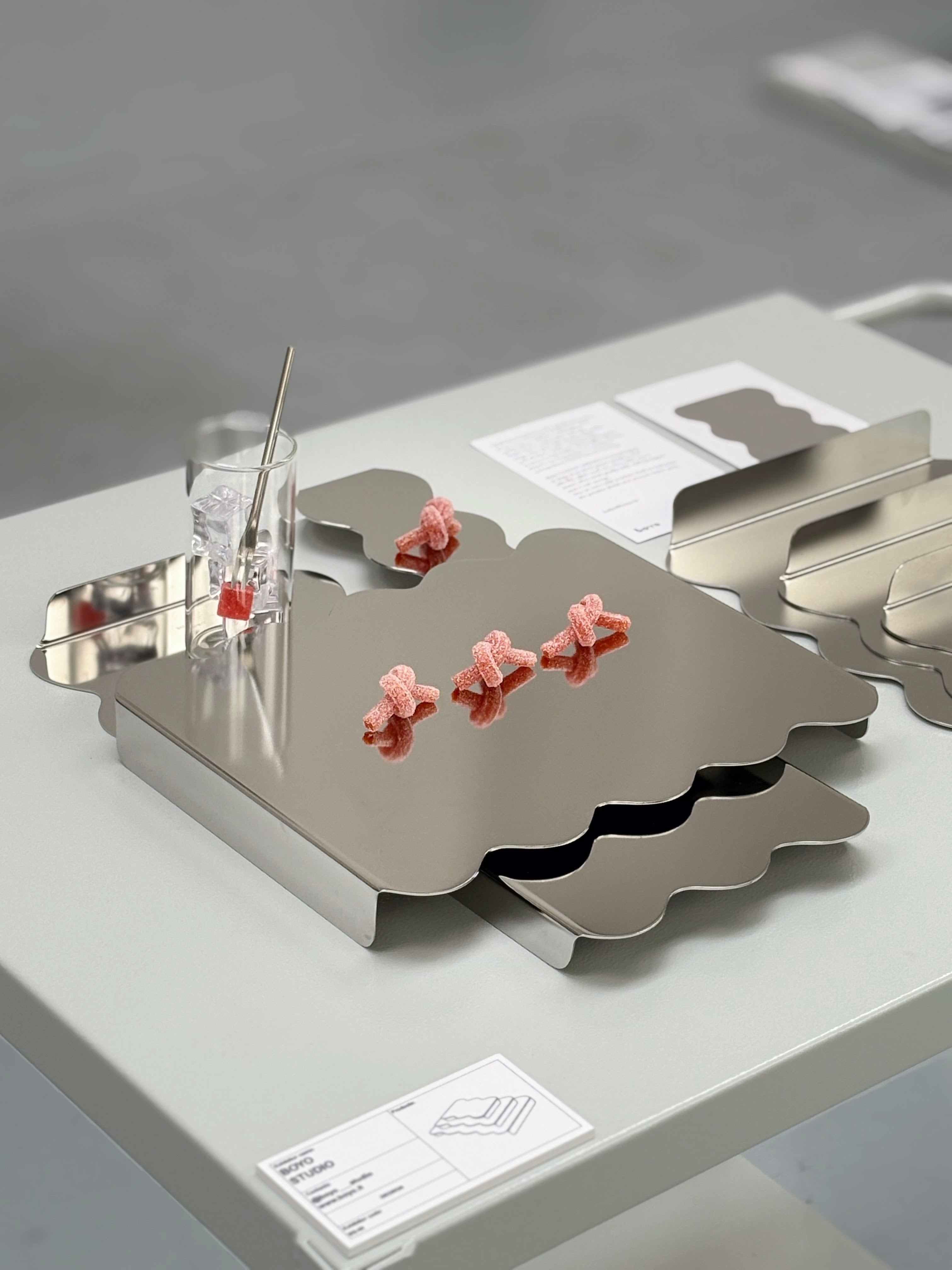 Close up of the trays and stands with wavy edges at Milan Design week